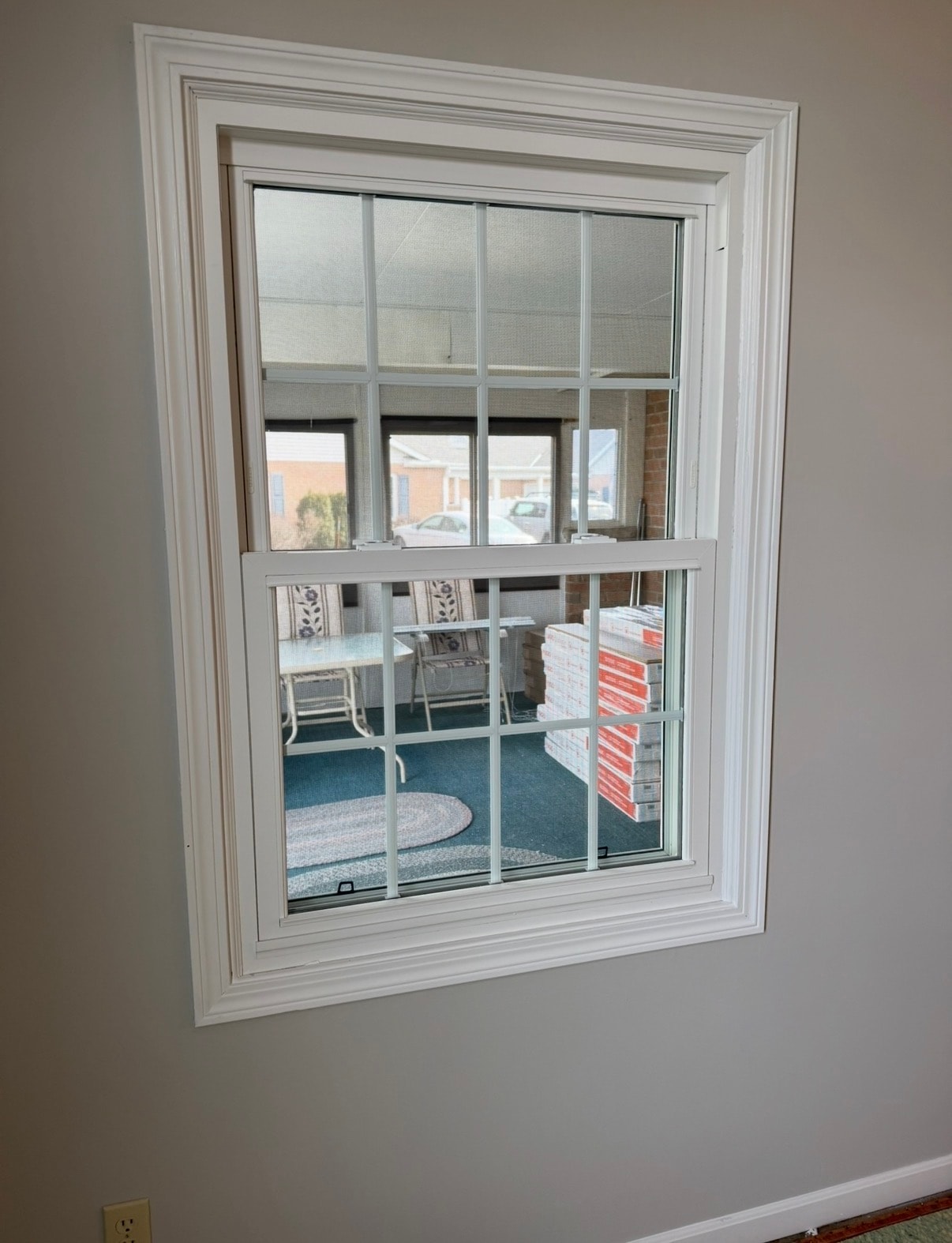 After window trim painting in Akron Ohio — Akron painter completed bright white window trim and wall painting, Akron painters interior trim painting results Akron Ohio