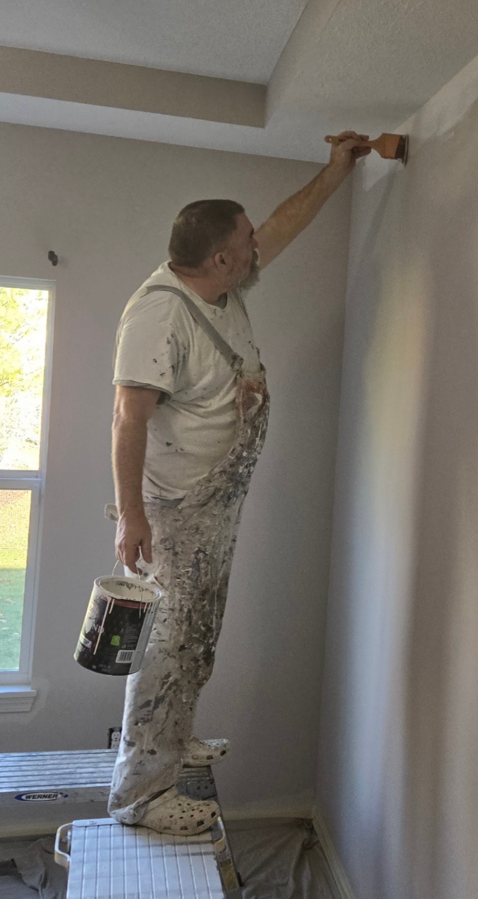 Jay the Akron painter cutting in ceiling with brush on step stool — Kenmore Painters interior painting Akron Ohio