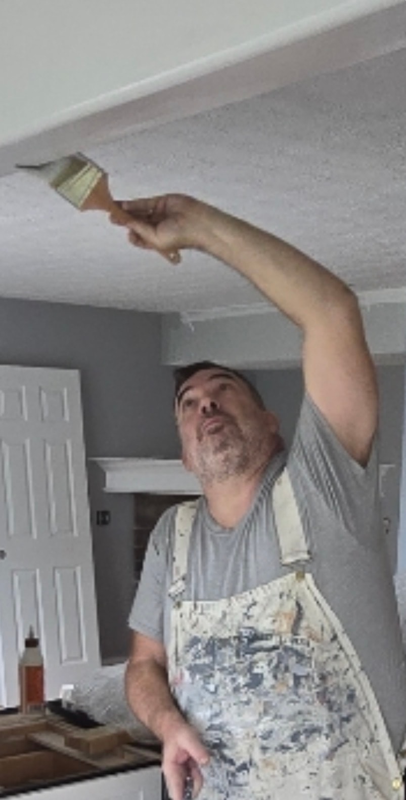 Jay the Akron painter cutting in ceiling with brush — Kenmore Painters master painter at work in Akron Ohio