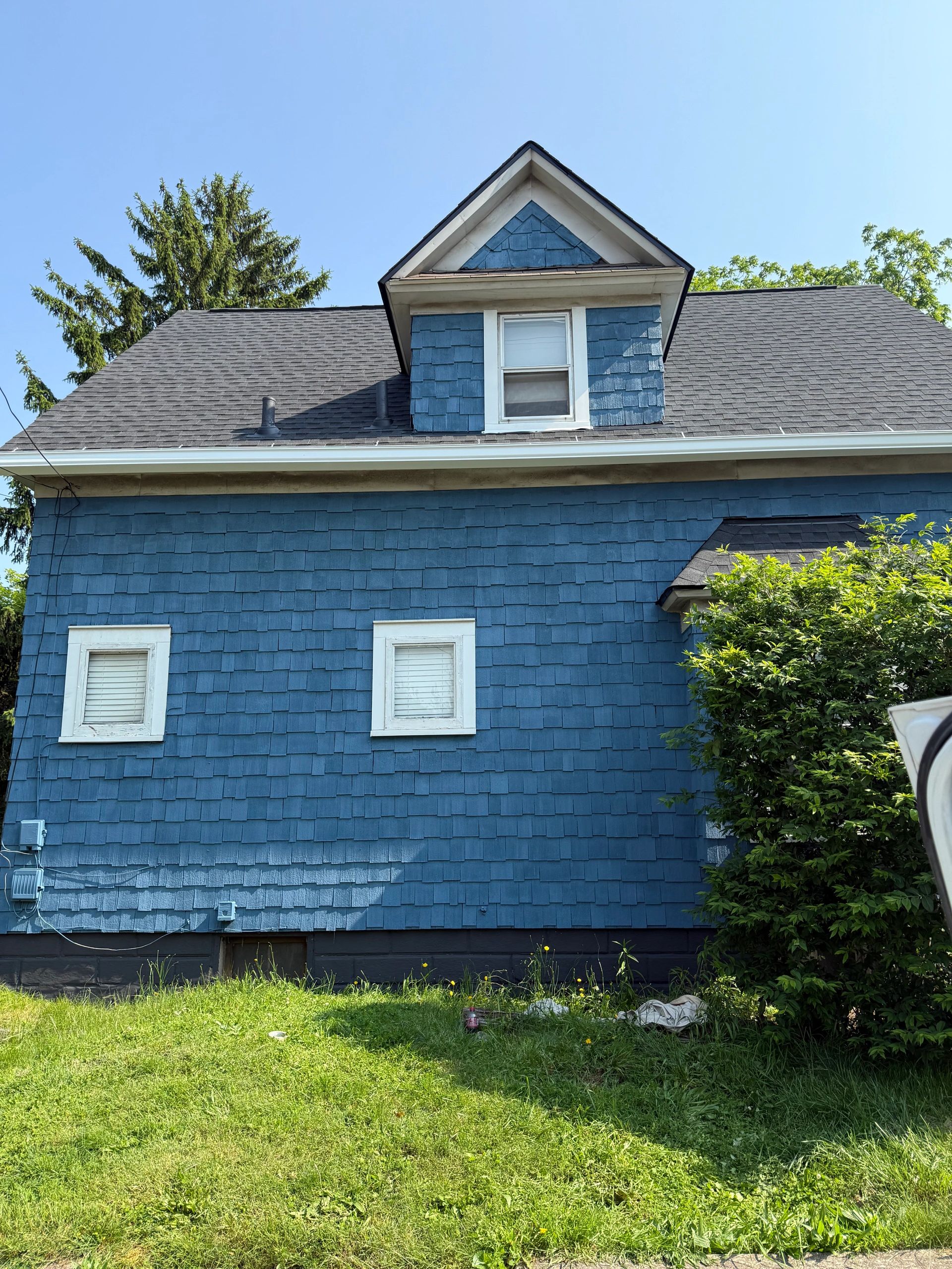 Professional painting team at work on commercial exterior